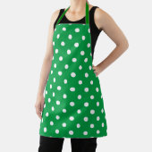 Green apron with white polka dots, displayed flat schort (Insitu)