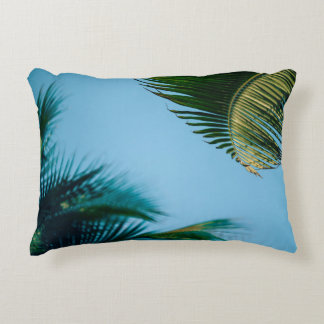 Green palm tree under blue sky in the morning accent kussen