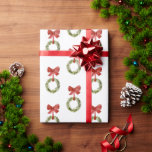Greenery Christmas Wreath Red Bow Cadeaupapier<br><div class="desc">Boxwood groen kerstkrans inpakpapier. Dit vakantieinpakpapier is voorzien van een rustieke groene kerstkrans die aan een rode strik hangt. Het perfecte kerstinpakpapier voor al uw kerstcadeaus.</div>