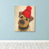 Grensdrager met Pet met rode klossen Canvas Afdruk (Insitu (Houten vloer))