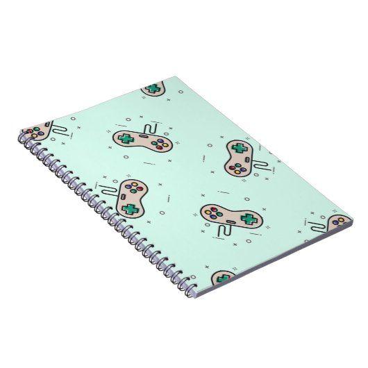 Grey game joystick op blauw notitieboek (Rechterzijde)