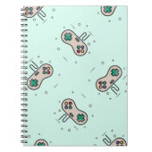 Grey game joystick op blauw notitieboek (Voorkant)