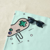 Grey game joystick op blauw strandlaken (In situ)