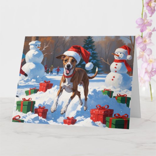 Greyhound Rent in de Sneeuw met Kerstmuts Kaart (Orchidee)