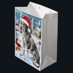 Greyhound Winter Wonderland Christmas Joy Medium Cadeauzakje<br><div class="desc">Dit feestelijke ontwerp vangt de vrolijke sfeer van het vakantieseizoen, met een schattige pup die een kerstmuts draagt. De hond is genesteld in een winterwonderland, compleet met een sneeuwpop, een versierde kerstboom en prachtig ingepakte cadeaus. Sneeuwvlokken herfsten zachtjes en voegen een magische toets toe aan het tafereel, terwijl de levendige...</div>