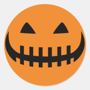 Griezelig grijnzend pompoen gezicht Sticker
