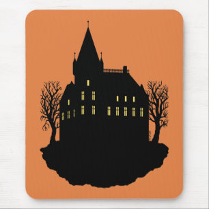Griezelig landhuis in silhouet muismat