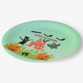 Griezelige groene handen die opkomen met pompoenen papieren bordje (Gekanteld)