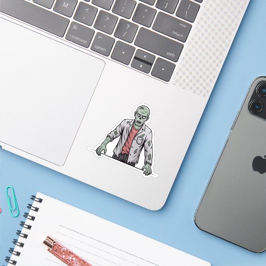 Griezelige groene zombie Halloween sticker (Laptop met iPhone)