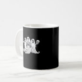 Griezelige koffie slurpende pompoen houdend koffiemok (Voorkant links)