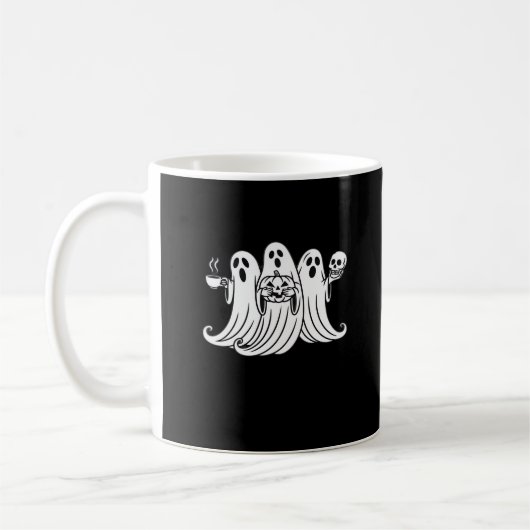 Griezelige koffie slurpende pompoen houdend koffiemok (Links)