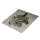 Griffiekkop, fragment van een bevestigingselement tegeltje (Zijkant)