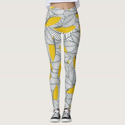 Grijs en geel bladpatroon. leggings (Voorkant)