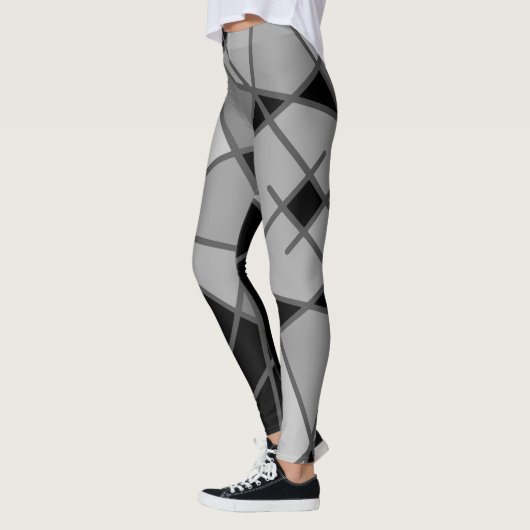 Grijs en zwart asymmetrische Leggings door Joya Ev (Links)