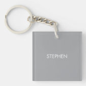Grijs minimalistisch aangepaste naam sleutelhanger (voorkant)