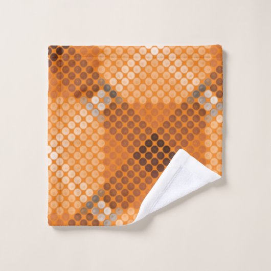 Grijs tot bruine cirkels boven sinaasappel, waarbi bad handdoek (Wasdoekje)