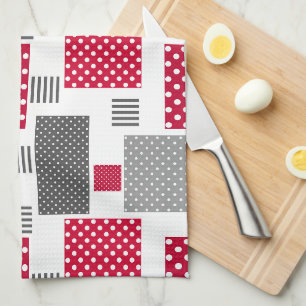 Grijsrode stip patchwork op witte achtergrond theedoek