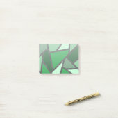 Grijsschaduw van groen gekleurd glas post-it® notes (Op bureau)