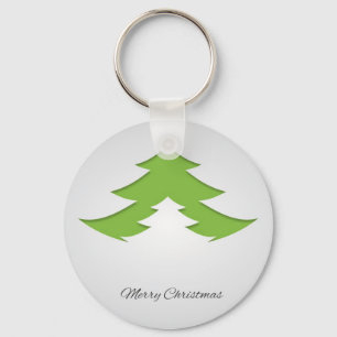 Grijze achtergrond met kerstboom sleutelhanger