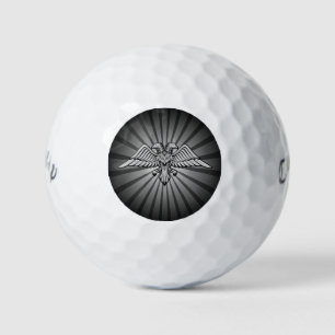 Grijze arend met twee koppen golfballen
