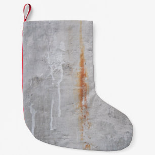 Grijze betonwand kleine kerstsok
