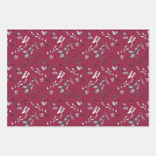Grijze bladeren en rode bessen op rood, blauw, zwa inpakpapier vel (Voorkant)