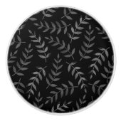 grijze bladeren patroon op zwart keramische knop (Voorkant)