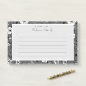 Grijze bloemen post-it® notes (Op bureau)