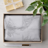 Grijze clip wordt verzonden op witte ontkoppeling tissuepapier (Geschenk)