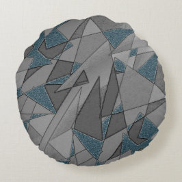 Grijze driehoeksnede met ruwe, donkerblauwe stukke rond kussen