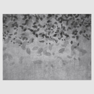 Grijze en zwarte bladeren op grijze ontkoppeling tissuepapier