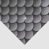 Grijze en zwarte visschaaltjes ontkoppelen tissuepapier (Detail)