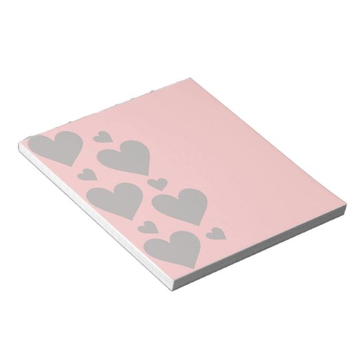 Grijze harten op een roze achtergrond notitieblok (Schuin)
