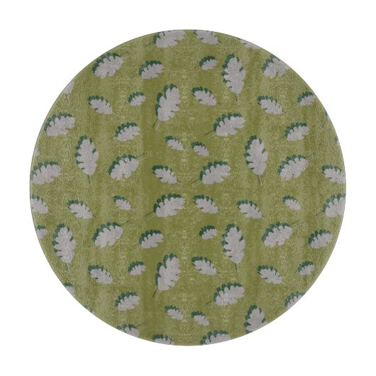 Grijze herfstbladeren patroon op een groene achter snijplank (Voorkant)