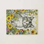 Grijze kitty kat zitten in bloemen legpuzzel (Horizontaal)