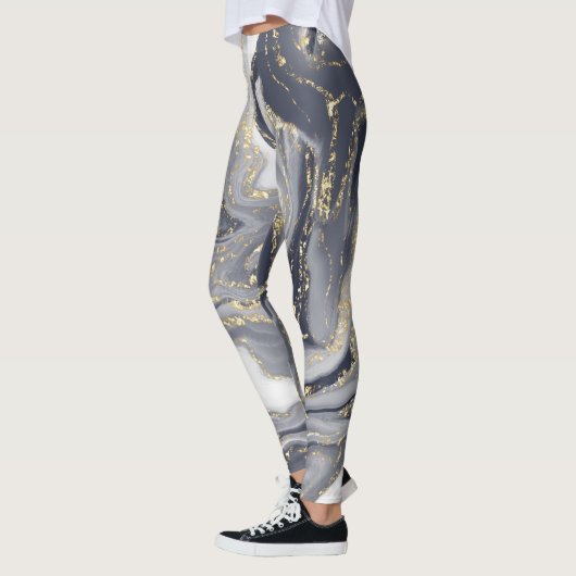 Grijze korrels, wit en goud leggings (Links)