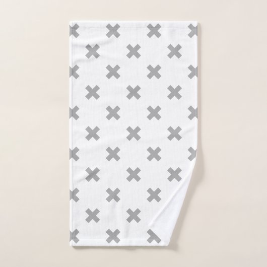 Grijze kruisstiften op wit handdoek (Handdoek)