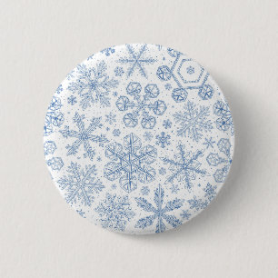 Grijze sneeuwvlokken op gebroken wit ronde button 5,7 cm