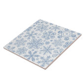 Grijze sneeuwvlokken op gebroken wit tegeltje (Zijkant)