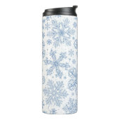 Grijze sneeuwvlokken op gebroken wit thermosbeker (Gedraaid links)