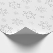Grijze sneeuwvlokken op wit kerstpapier cadeaupapier (Hoek)