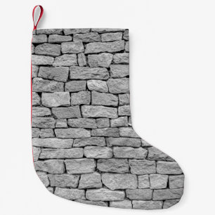 Grijze stenen muur, abstracte achtergrond. kleine kerstsok
