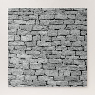 Grijze stenen muur, abstracte achtergrond. legpuzzel