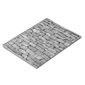 Grijze stenen muur, abstracte achtergrond. notitieboek (Linkerzijde)