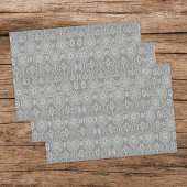 Grijze vezelige textiel octopus zaden met patronen inpakpapier vel