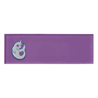 Grijze walvis met inkttekening naambadge