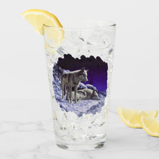 Grijze wolven in wintersneeuw bij nacht glas