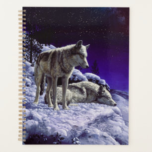 Grijze wolven in wintersneeuw bij nacht planner