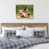 Grijze wolvenwelpen worstelen canvas afdruk (Insitu (Slaapkamer))