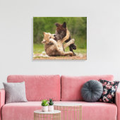 Grijze wolvenwelpen worstelen canvas afdruk (Insitu (Woonkamer))